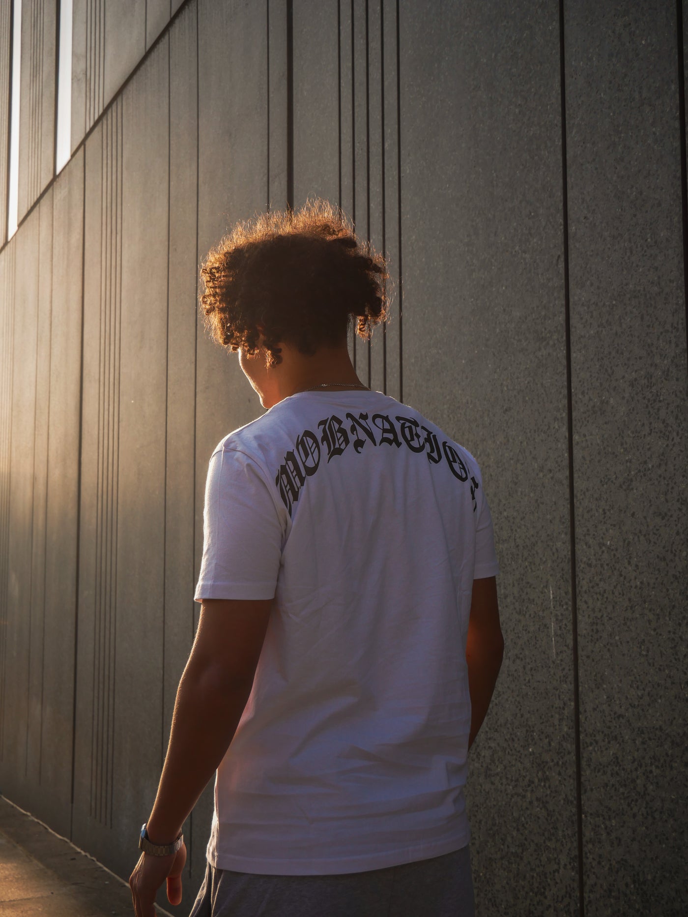 White arched tee