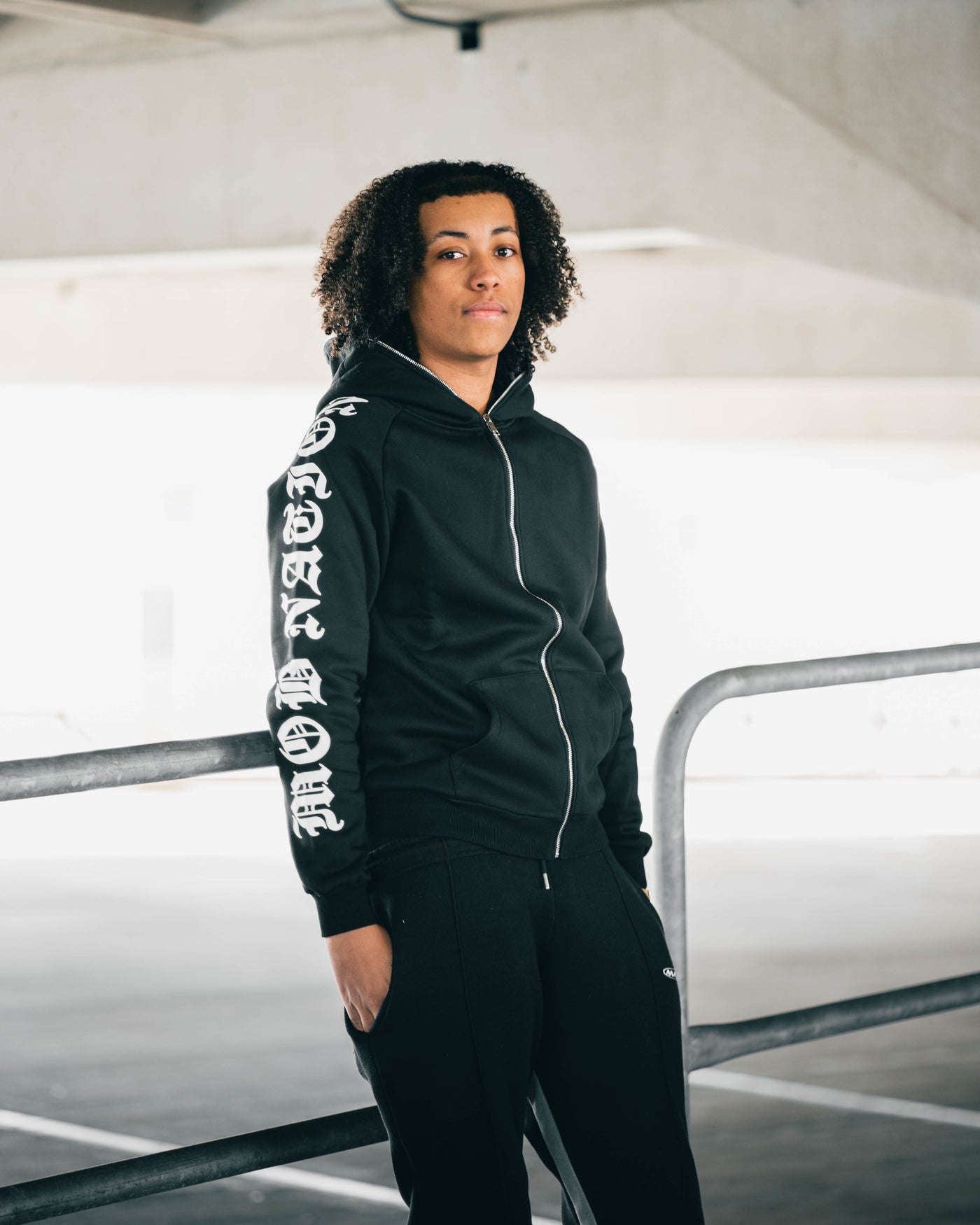 Black 'The Family' Zip-up