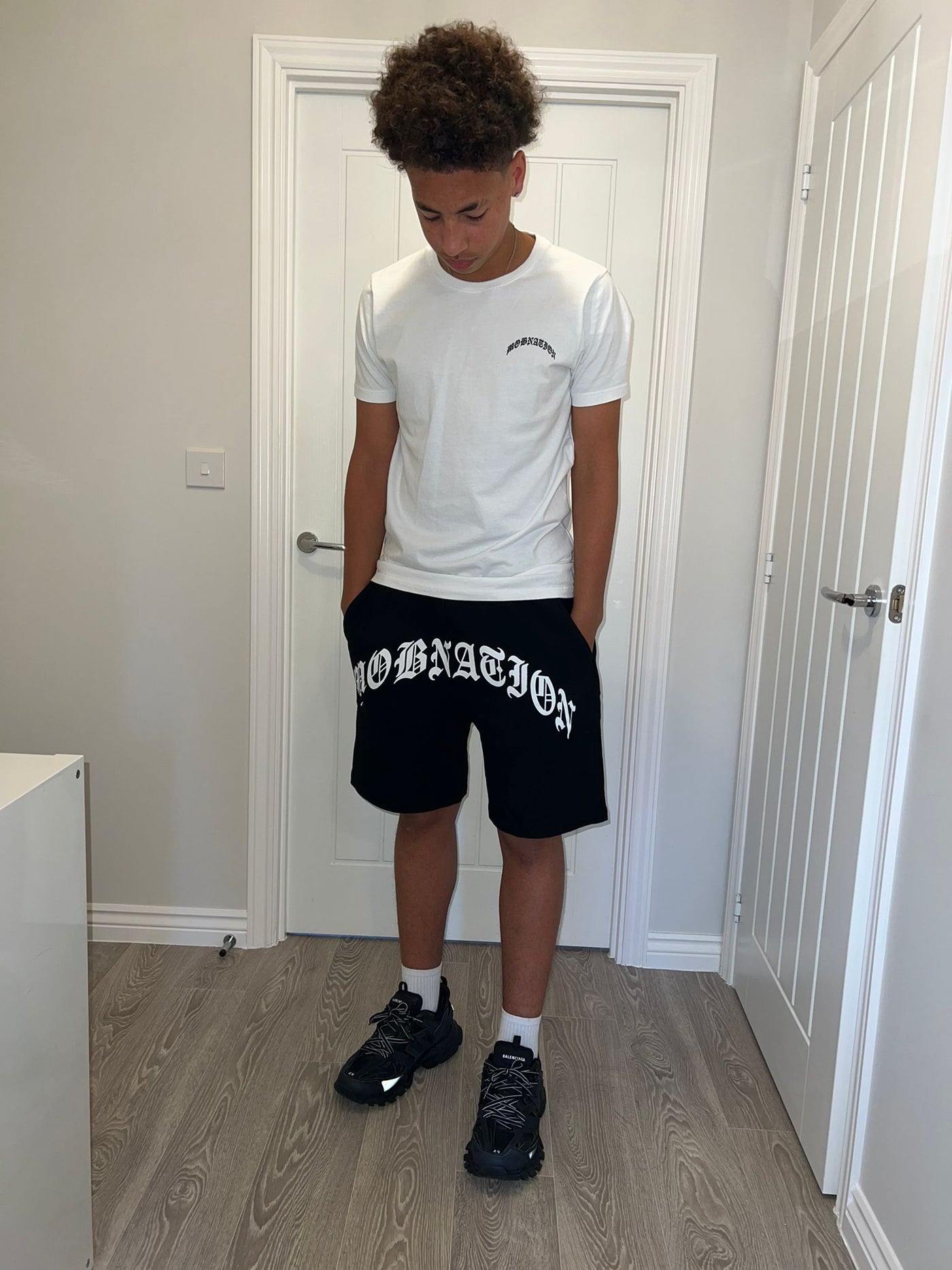 Black arched shorts